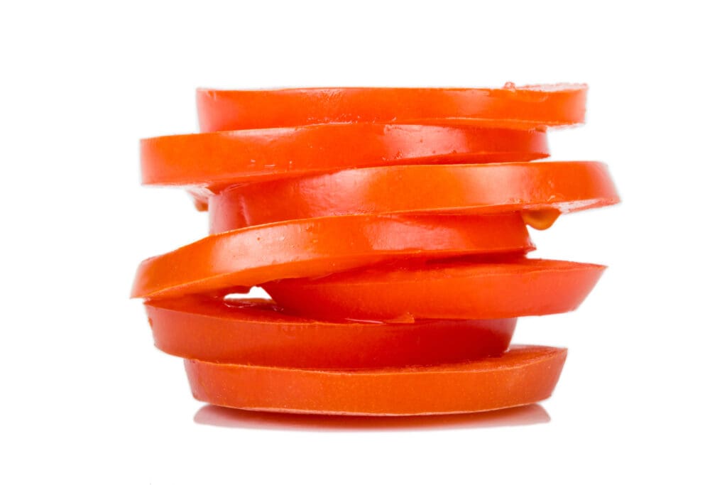 tomatoes sliced in stack scaled
